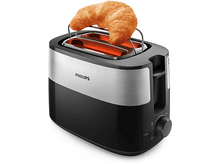Charger l&#39;image dans la galerie, Grille-pain Philips noir et argent avec un croissant dessus. Fond blanc.
