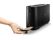 Charger l&#39;image dans la galerie, Un grille-pain Philips noir avec une main sortant une tranche de pain grillé sur fond blanc.
