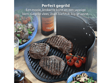 Charger l'image dans la galerie, Steaks grillés sur un grill, tomates cerises et une bouteille en arrière-plan. Aussi, un bol de champignons et un verre de liquide.
