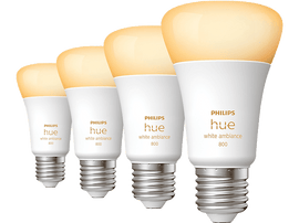 Quatre ampoules Philips Hue white ambiance. Elles sont blanches avec une lueur jaune.