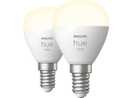 Deux ampoules intelligentes Philips Hue blanches. Elles ont une base blanche et une partie argentée à visser.