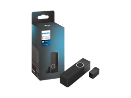 Une boîte et des composants de capteur de contact Philips Hue, design noir et blanc.