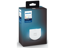 Charger l&#39;image dans la galerie, Emballage du module d&#39;interrupteur mural Philips Hue, boîte bleue avec produit blanc, trou de suspension.
