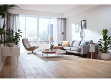 Charger l&#39;image dans la galerie, Salon avec canapé, chaise et fenêtre donnant sur une ville. Plantes, table basse et œuvres d&#39;art présentes.
