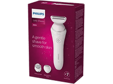 Charger l&#39;image dans la galerie, Une boîte Philips Lady Shaver 8000 avec un rasoir blanc et rose et des accessoires. La boîte est rouge foncé.

