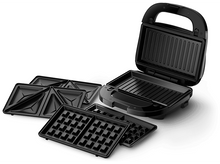 Charger l&#39;image dans la galerie, Sandwich maker noir avec différentes plaques pour différents types d&#39;aliments, fond blanc.
