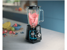 Charger l&#39;image dans la galerie, Un blender avec un smoothie rose à l&#39;intérieur, montrant les composants internes.
