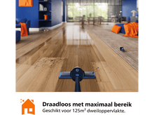 Charger l&#39;image dans la galerie, Plancher en bois et une machine de nettoyage. Texte en néerlandais : Draadloos met maximaal bereik.
