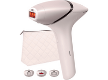 Charger l&#39;image dans la galerie, Un appareil d&#39;épilation Philips rose avec une pochette et trois têtes supplémentaires. Sur fond blanc.
