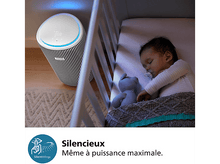 Charger l&#39;image dans la galerie, Bébé dormant dans un berceau. Purificateur d&#39;air. Texte : Silencieux.
