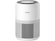 Purificateur d'air blanc avec un dessus arrondi et une partie inférieure rayée. Marque 'PHILIPS'.