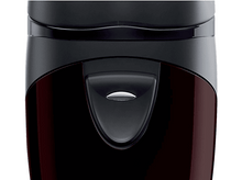 Charger l'image dans la galerie, Gros plan sur un rasoir électrique noir et bordeaux.

