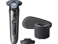 Rasoir électrique avec socle de chargement, étui de voyage et accessoire de nettoyage.