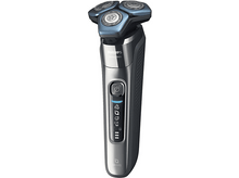 Charger l&#39;image dans la galerie, Rasoir électrique avec des accents bleus, gros plan.
