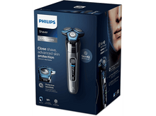 Charger l&#39;image dans la galerie, Une boîte Philips Shaver Série 7000 avec un rasoir et des détails sur le produit.
