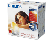 Charger l&#39;image dans la galerie, Une boîte Philips Wake-up Light. Elle montre une femme au lit et les détails du produit.
