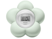 Thermomètre de chambre d'enfant en forme de fleur, l'affichage numérique indique la température.