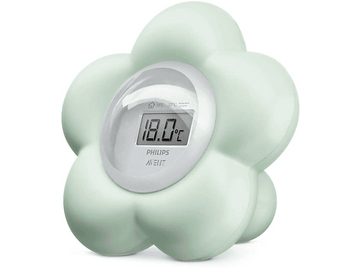 Un thermomètre pour bébé en forme de fleur vert menthe affiche 18,0°C.
