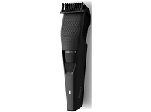 Charger l&#39;image dans la galerie, Une tondeuse à barbe Philips noire, montrant les réglages et le bouton d&#39;alimentation.
