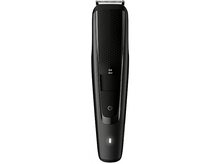 Charger l&#39;image dans la galerie, Tondeuse à barbe Philips noire, vue rapprochée, avec bouton d&#39;alimentation et affichage.
