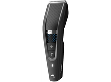 Charger l'image dans la galerie, Tondeuse à barbe Philips noire avec réglages et boutons, fond blanc.
