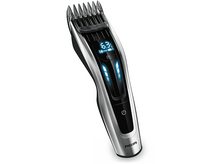 Charger l'image dans la galerie, Une tondeuse à cheveux électrique Philips avec affichage numérique.
