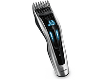 Charger l'image dans la galerie, Tondeuse à barbe Philips argent et noir. Affichage numérique et bouton d'alimentation. Lames dessus.
