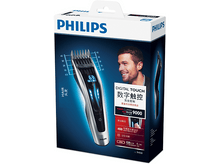 Charger l'image dans la galerie, Boîte de tondeuse à cheveux Philips. Elle montre un homme et la tondeuse avec des réglages.
