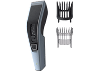 Tondeuse à cheveux bleue et noire avec deux sabots. La tondeuse a un écran affichant des chiffres. Fond blanc.