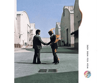 Charger l&#39;image dans la galerie, Pochette d&#39;album: Deux hommes se serrent la main, l&#39;un en feu, dans une rue.
