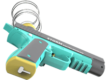 Charger l&#39;image dans la galerie, Un pistolet à eau jouet turquoise, gris et jaune avec un réservoir d&#39;eau transparent. Le texte sur le pistolet dit &#39;STORM ELECTRIC WATER GUN&#39; sur fond noir.
