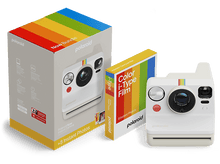 Charger l&#39;image dans la galerie, Un appareil photo Polaroid avec une boîte et des films. L&#39;appareil est blanc avec une bande arc-en-ciel.
