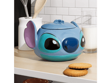 Charger l&#39;image dans la galerie, Un pot à biscuits Stitch bleu avec des biscuits sur un comptoir.
