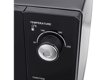 Charger l&#39;image dans la galerie, Gros plan du panneau de commande d&#39;un four à micro-ondes noir avec cadran de température.
