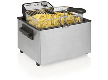 Charger l&#39;image dans la galerie, Friteuse en acier inoxydable avec panier de frites, poignée noire, fond blanc.
