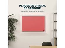 Charger l&#39;image dans la galerie, Un carré rouge avec des bordures blanches et du texte sur un mur blanc, avec une plante et une étagère.
