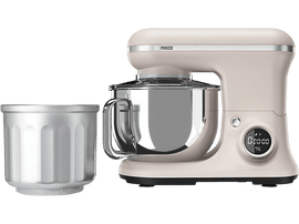 Batteur sur socle crème avec un bol argenté à côté. Un bol argenté séparé est à gauche.