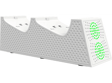 Charger l&#39;image dans la galerie, Chargeur de manette de jeu blanc avec des lumières vertes.
