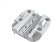 Un support de console de jeu blanc avec des flèches bleues. Il possède des ports de chargement et un haut-parleur.