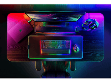 Charger l&#39;image dans la galerie, Vue de dessus d&#39;une configuration de jeu avec éclairage néon et un ordinateur portable.
