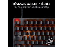 Charger l&#39;image dans la galerie, Gros plan sur un clavier avec touches orange éclairées. Texte au-dessus : &#39;Réglages rapides intégrés&#39;.

