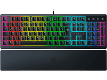 Charger l&#39;image dans la galerie, Un clavier Razer avec des touches multicolores. Il possède un repose-poignets et se trouve sur une surface noire.
