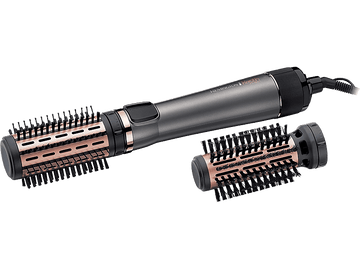 Fer à coiffer Remington Keratin Protect avec deux accessoires brosse, gris et or rose. Fond noir.