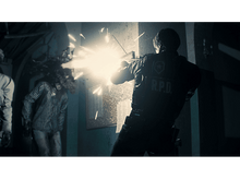 Charger l&#39;image dans la galerie, Scène d&#39;un jeu vidéo : un homme tire sur un zombie, provoquant une explosion sanglante.
