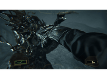 Charger l&#39;image dans la galerie, Vue à la première personne d&#39;une main gantée frappant un monstre dans un environnement sombre.
