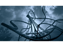 Charger l&#39;image dans la galerie, Image abstraite de tentacules sombres et ondulés contre un ciel sombre et nuageux.
