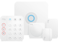 Un système de sécurité blanc avec un clavier, une station de base et plusieurs capteurs, de marque Ring.