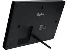 Charger l&#39;image dans la galerie, Gros plan sur le bas d&#39;un appareil, montrant un port de charge et des trous de haut-parleur.
