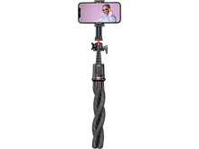 Charger l&#39;image dans la galerie, Un trépied flexible avec un smartphone attaché, avec une personne sur l&#39;écran du téléphone.
