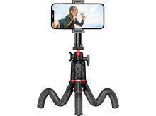 Charger l&#39;image dans la galerie, Un smartphone sur un trépied flexible, affichant un selfie d&#39;une femme faisant le signe de la paix.
